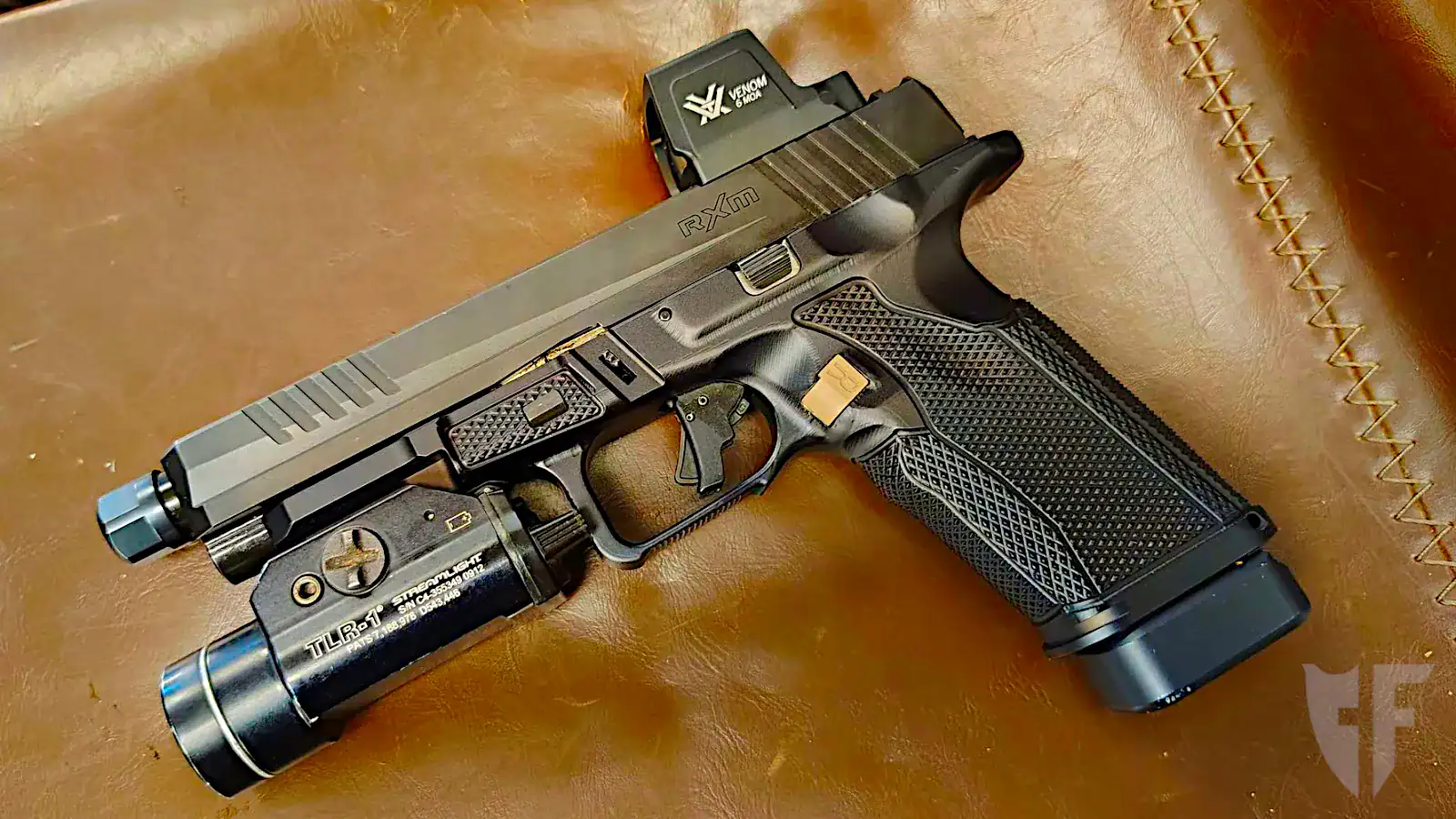 Ruger RXM pistol with Vortex Venom red dot sight and Streamlight TLR-1 HL weapon light mounted
